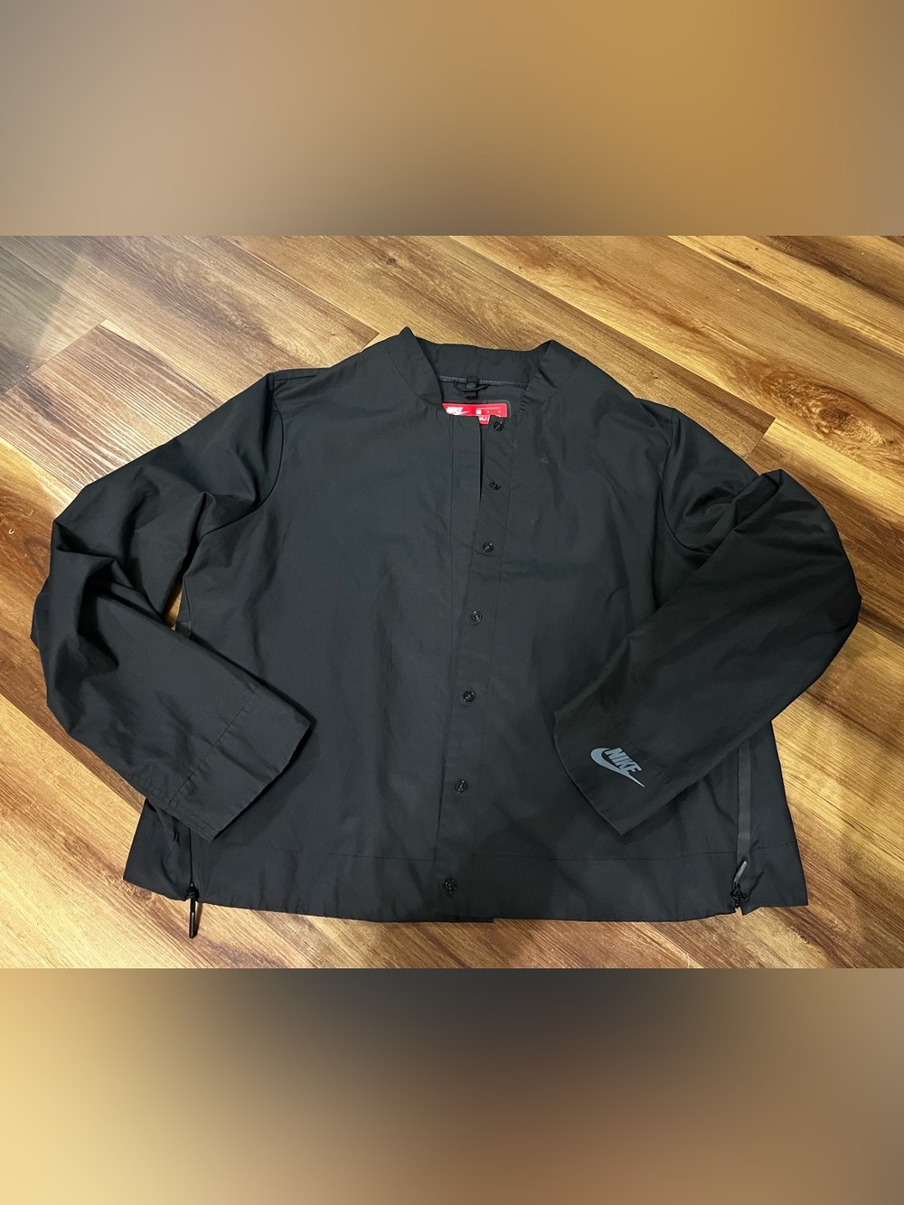 Nike women’s oversized Black Lightweight Collarless boxy Jacket